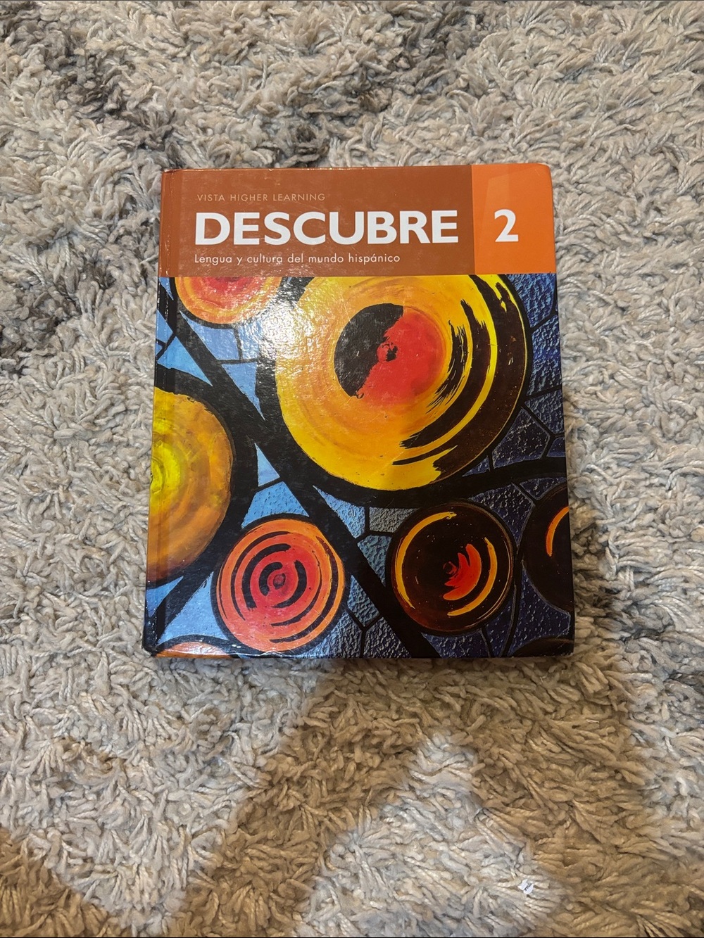 Descubre 2 Language Textbook - Orange & Multicolor Abstract Cover